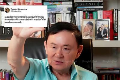 Thaksin postpones return