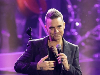 Robbie Williams shares his thoughts on plastic surgery as he considers fillers