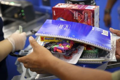 Your family will probably spend $890 on back-to-school shopping this year, retail trade group says