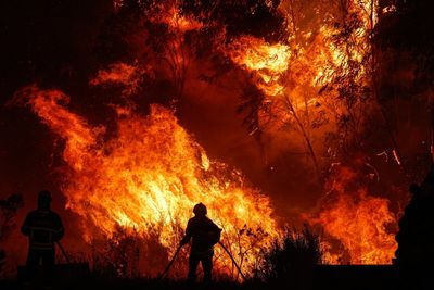 Portugal fires – live: Tourists flee Odemira as wildfire inferno spreads to Algarve in 46C heat