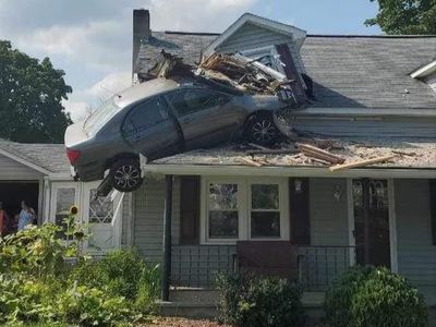 Wild photos capture car lodged into second floor of Pennsylvania home after ‘intentional’ crash