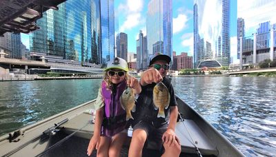 Cheering on the memory-making fishing on the Chicago River