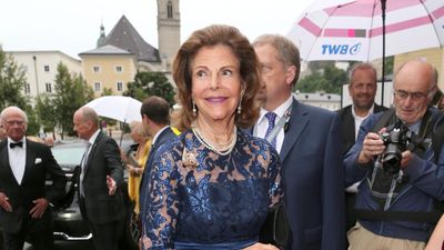 Queen Silvia of Sweden's sparkling sheer gown and plush white pashmina wows in Salzburg