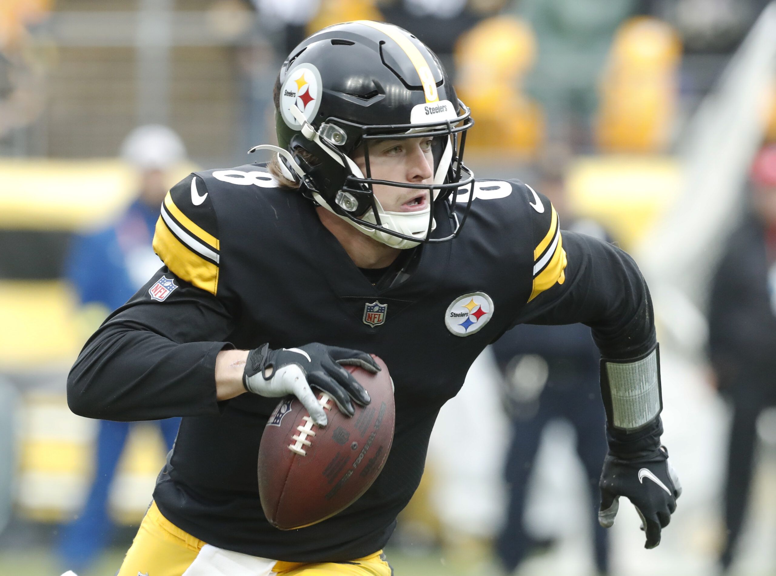 Pittsburgh Steelers quarterback Kenny Pickett rolls out against the Tampa  Bay Buccaneers during an NFL football game at Acrisure Stadium, Sunday, Oct.  16, 2022 in Pittsburgh. (Winslow Townson/AP Images for Panini Stock