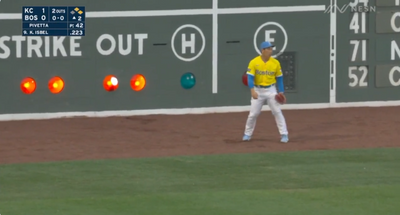 A baseball landed in a scoreboard light on Fenway Park’s Green Monster and everyone was so confused