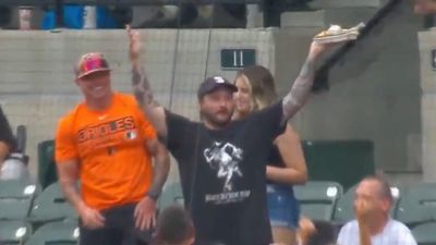 Orioles Fan Makes an All-Time, BBQ-Assisted Foul Ball Snag