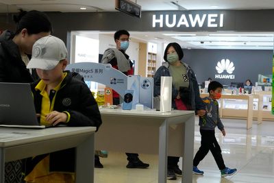 Chinese tech giant Huawei reports sales, profit up despite US sanctions