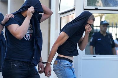 Scuffles break out outside Athens court as arrested Croatian soccer fans testify over deadly attack