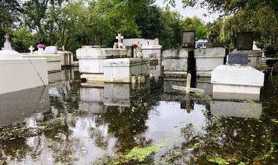 As Louisiana’s coast washes away, the dead are the first to go