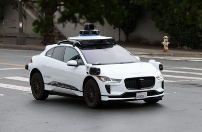 Google’s Waymo and GM’s Cruise win approval to widen robotaxi service in San Francisco—prompting a vow from angry residents to continue staging traffic cone protests