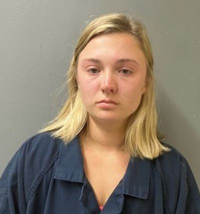 Fourth suspect charged with assault in Alabama riverfront brawl as she turns herself in to police