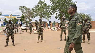 Niger coup supporters protest West African military force