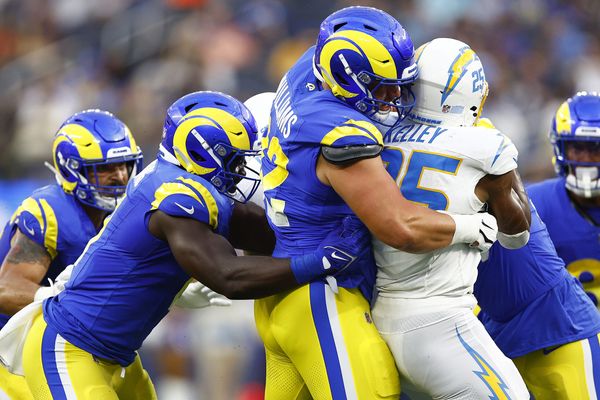 Los Angeles Rams wide receiver Tyler Johnson (14) reaches for the pass  while being held by Los Angeles Chargers cornerback AJ Uzodinma (35) in a  NFL preseason game. The Chargers defeated the