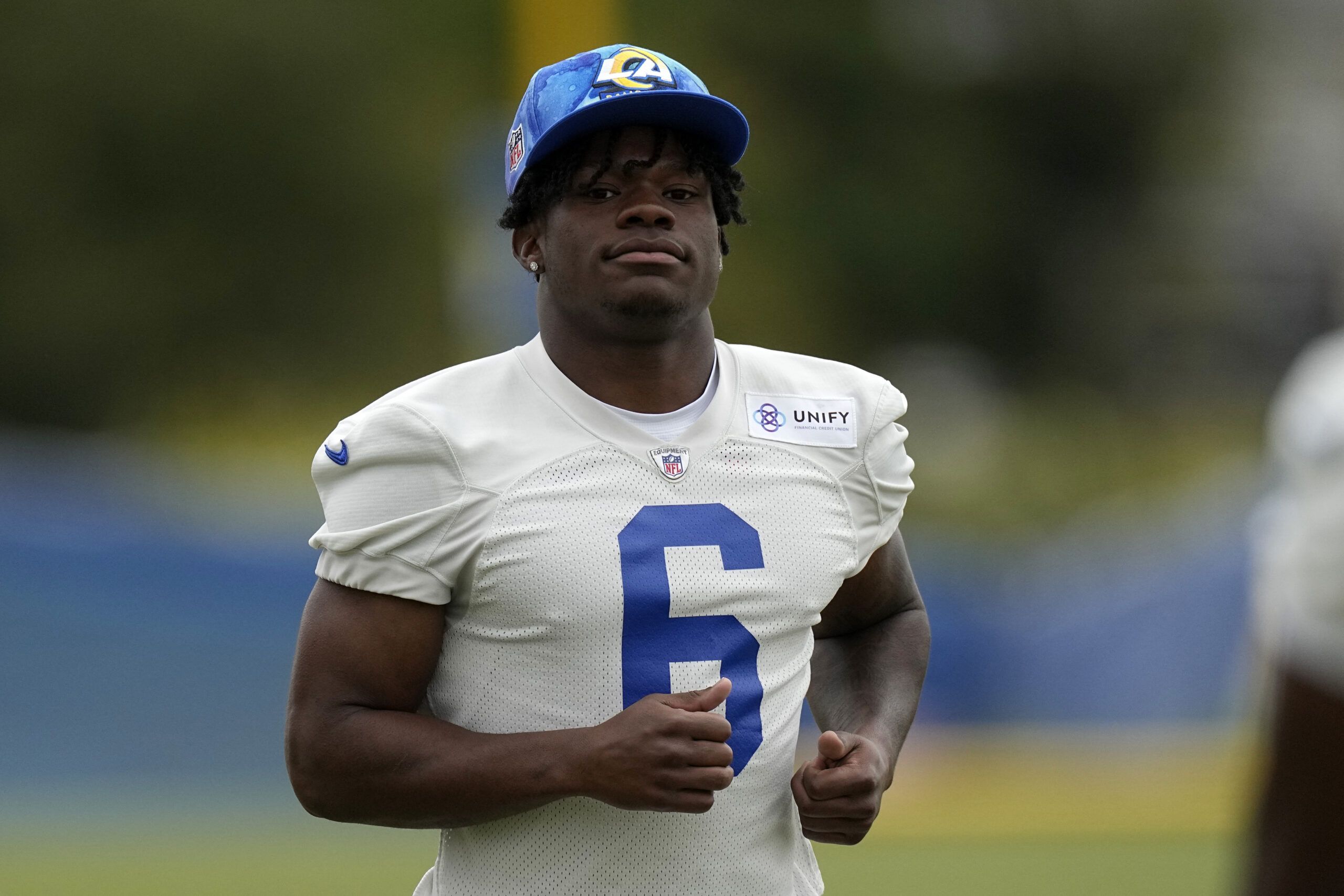 Rams' Tre Tomlinson gets advice from uncle LaDainian Tomlinson