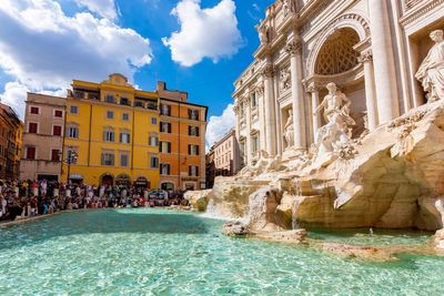 Tourist filmed climbing into Rome’s Trevi Fountain to fill her water bottle