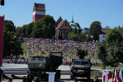 Poland showcases military might in a parade as war rages in neighboring Ukraine
