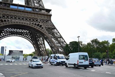 Drunk tourists fall asleep on the Eiffel Tower after breaking in at night