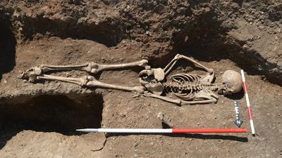 Medieval girl buried face down with bound ankles, likely so she couldn't 'return' from the grave