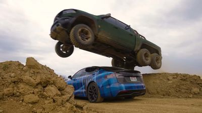 Watch Six-Wheeled Ram TRX Effortlessly Jump Over Tesla Model S