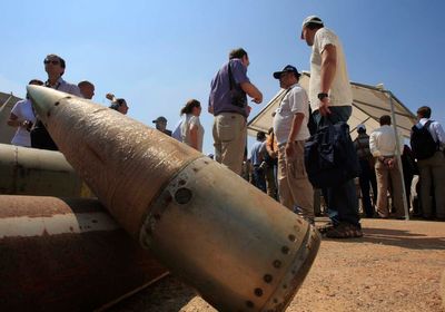 What are cluster bombs and why are they banned in some countries?