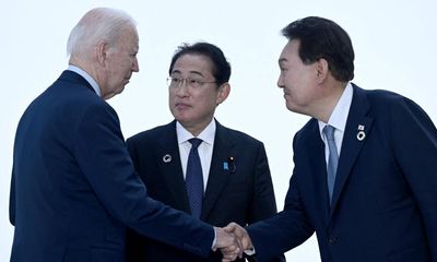 US promises ‘new era’ as Biden prepares to host first summit with Japan and South Korea