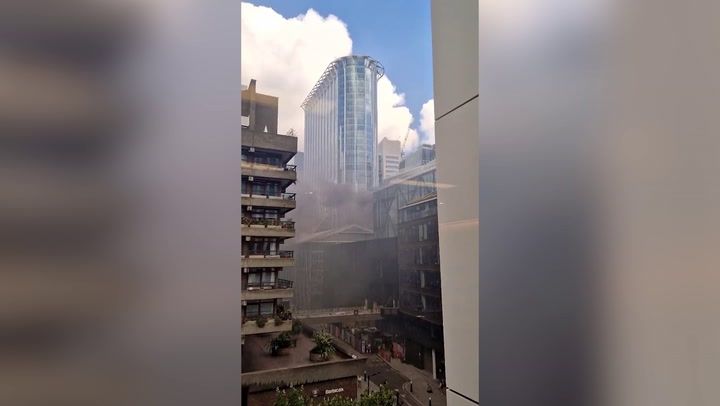 Buildings evacuated and roads closed after fire in…