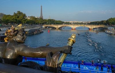 'What a special place to be in.' Triathletes swim in the Seine ahead of Paris Olympics