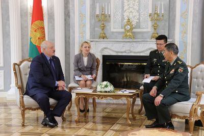 China's defense minister promises to boost cooperation with Russian ally Belarus