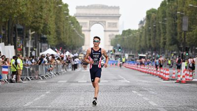 Britain's Alex Yee goes in Seine to win Olympic triathlon test event