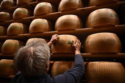 Parmesan cheese makers in Italy are fighting counterfeits by embedding edible microchips in their cheeses