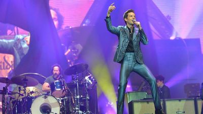 The Killers issue an apology after inviting Russian drummer on stage in Georgia, and referring to the fan as the audience's "brother"