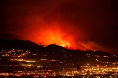 Cooler weather overnight helps firefighters battling a wildfire on Spain's Tenerife island