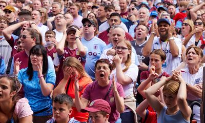Rival fans gather to cheer on England before Premier League match