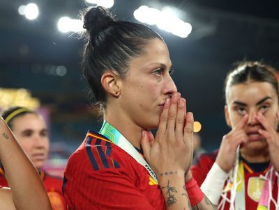 Spain star Jenni Hermoso reacts after FA president kisses her on lips