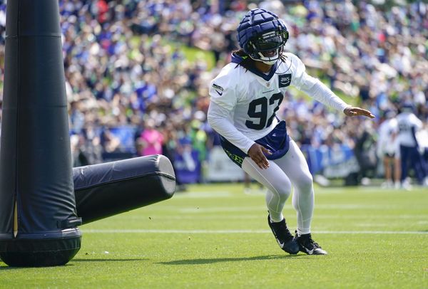 Seattle Seahawks linebacker Levi Bell (98), linebacker Boye Mafe (53), and  safety Jerrick Reed II (32) celebrate during an NFL pre-season football  game against the Minnesota Vikings, Thursday, Aug. 10, 2023 in