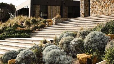 5 ways to landscape a front yard with rocks that add easy impact and calming organic style