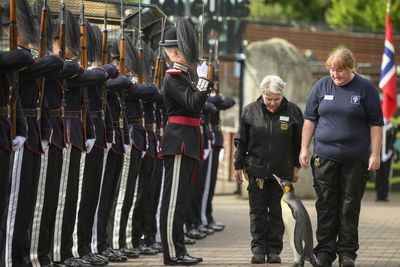 Guard of honour for Edinburgh Zoo mascot penguin as it is promoted to general