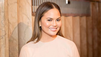 Chrissy Teigen's open-plan living space features our favorite color trend of 2023, and designers adore its subtle simplicity