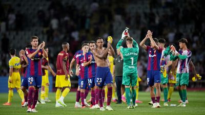 Barcelona gets late goals to win first official match at its temporary new home
