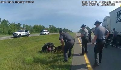 Prosecutor asks judge to throw out charges against Black truck driver mauled by police dog in Ohio