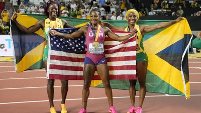 Richardson upstages Jamaicans to claim 100m as Holloway hurdles into legend