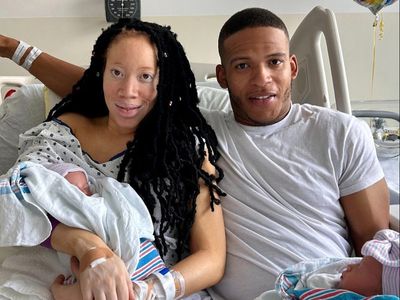 Couple welcomes twins on their shared birthday