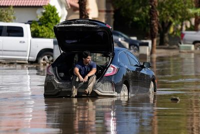 As Tropical Storm Hilary shrinks, desert and mountain towns dig themselves out of the mud