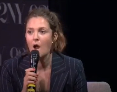 Drew Barrymore ushered away after man ‘rushes stage’ during live event
