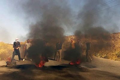 Residents in southern Syria raid ruling party offices, block road as protests over economy intensify