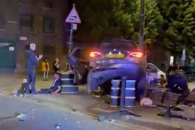 Four people in hospital with one fighting for life after car in police chase crashes outside mosque