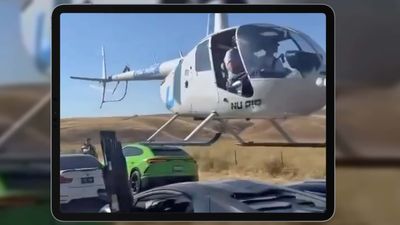 Video: Helicopter Hovers Dangerously Low Over Supercars On Dusty Road