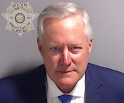 Trump ally Mark Meadows turns himself in after Georgia election indictment