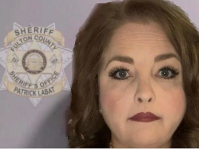 ‘Stop the Steal’ organiser makes her own Fulton County mugshot in bizarre act of solidarity with Trump