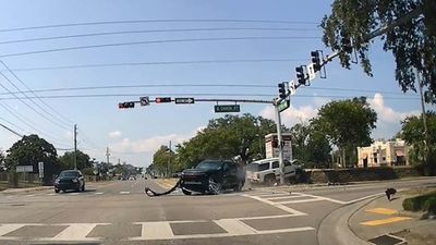 Watch Chevy Tahoe Crash Into Another Chevy Tahoe Running Red Light